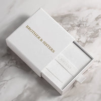 Thumbnail for B&S Layla anklet inside white slide-drawer gift box with embossed suede pouch on marble — gift jewelry packaging