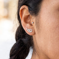 Thumbnail for The silver stud earrings worn, close-up | SKU: 42008-silver