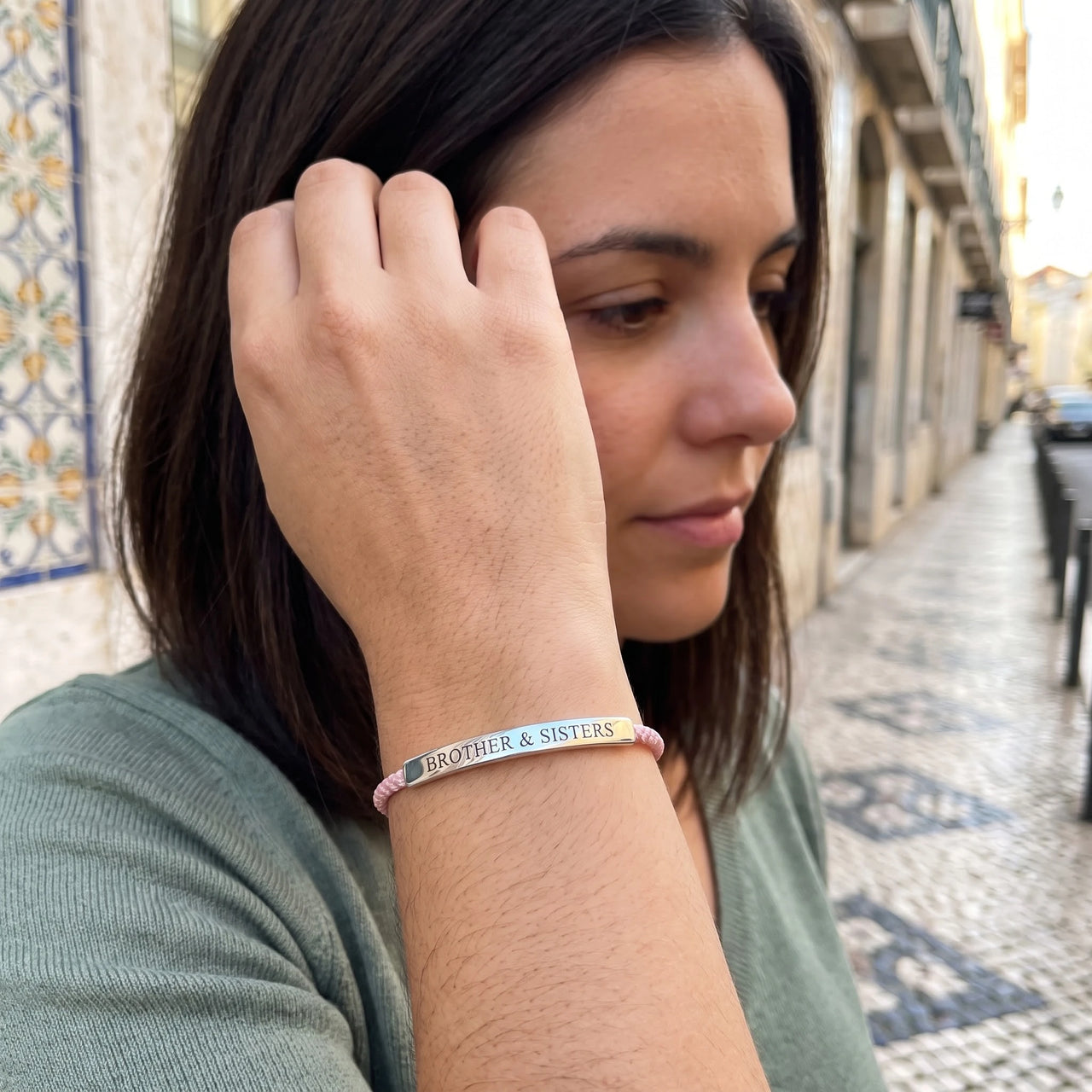 Pink string bracelet — worn, everyday gesture, silver | SKU: lecorail-wg