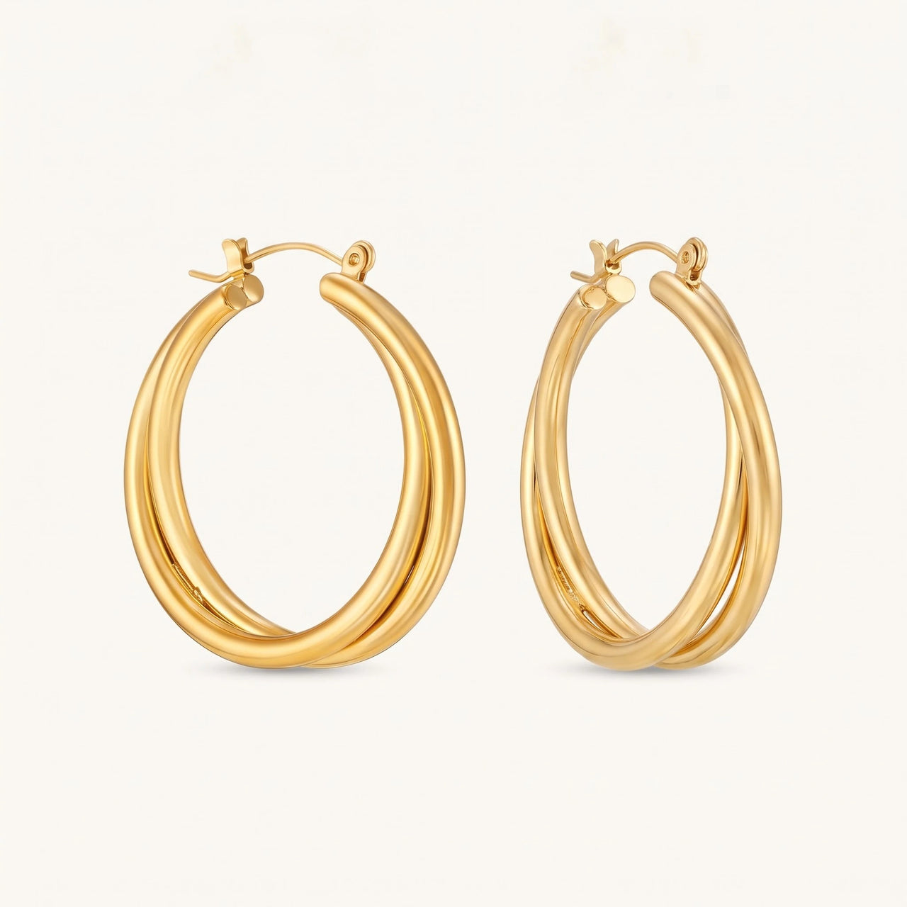 The Joints, gold earrings — packshot | SKU: lescroisees