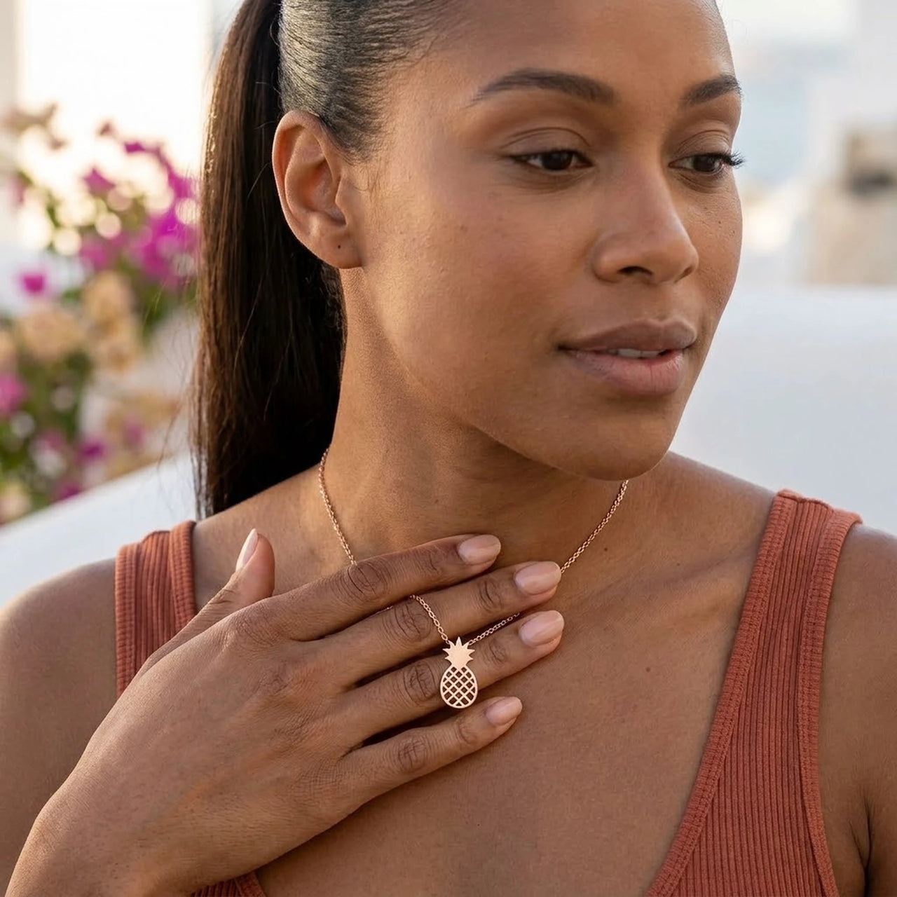 Pineapple jewellery — worn, everyday gesture, rose gold | SKU: 8050907-rose-gold