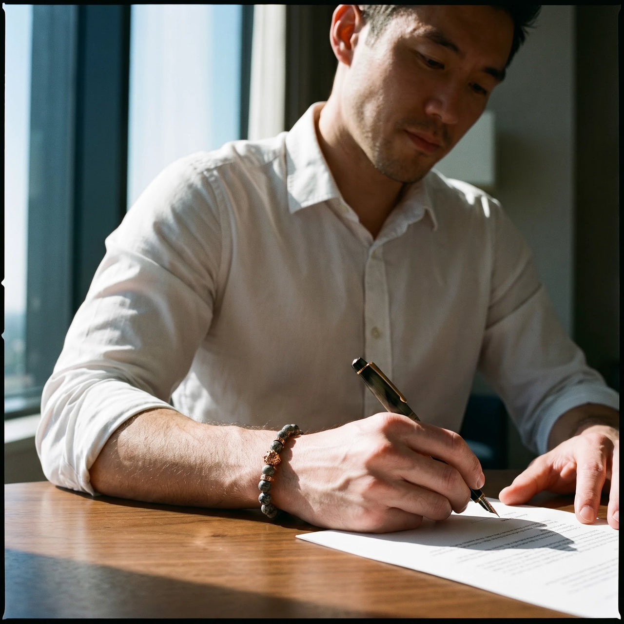 Rose Gold Lion & Grey Stones Bracelet – worn while signing a contract | Brother & Sisters | SKU: 20866222-rose-gold-XS-14-15, 20866222-rose-gold-S-16-17, 20866222-rose-gold-M-18-19, 20866222-rose-gold-L-20-21, 20866222-rose-gold-XL-22-23