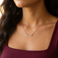 Thumbnail for Minimalist Name Necklace in rose gold worn at the collarbone, the name Livia | SKU: minimalistnn-rosegold