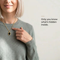 Thumbnail for Woman wearing the black gold oval pendant, only she knows the photo inside | SKU: TPH-OVLN-GOLD