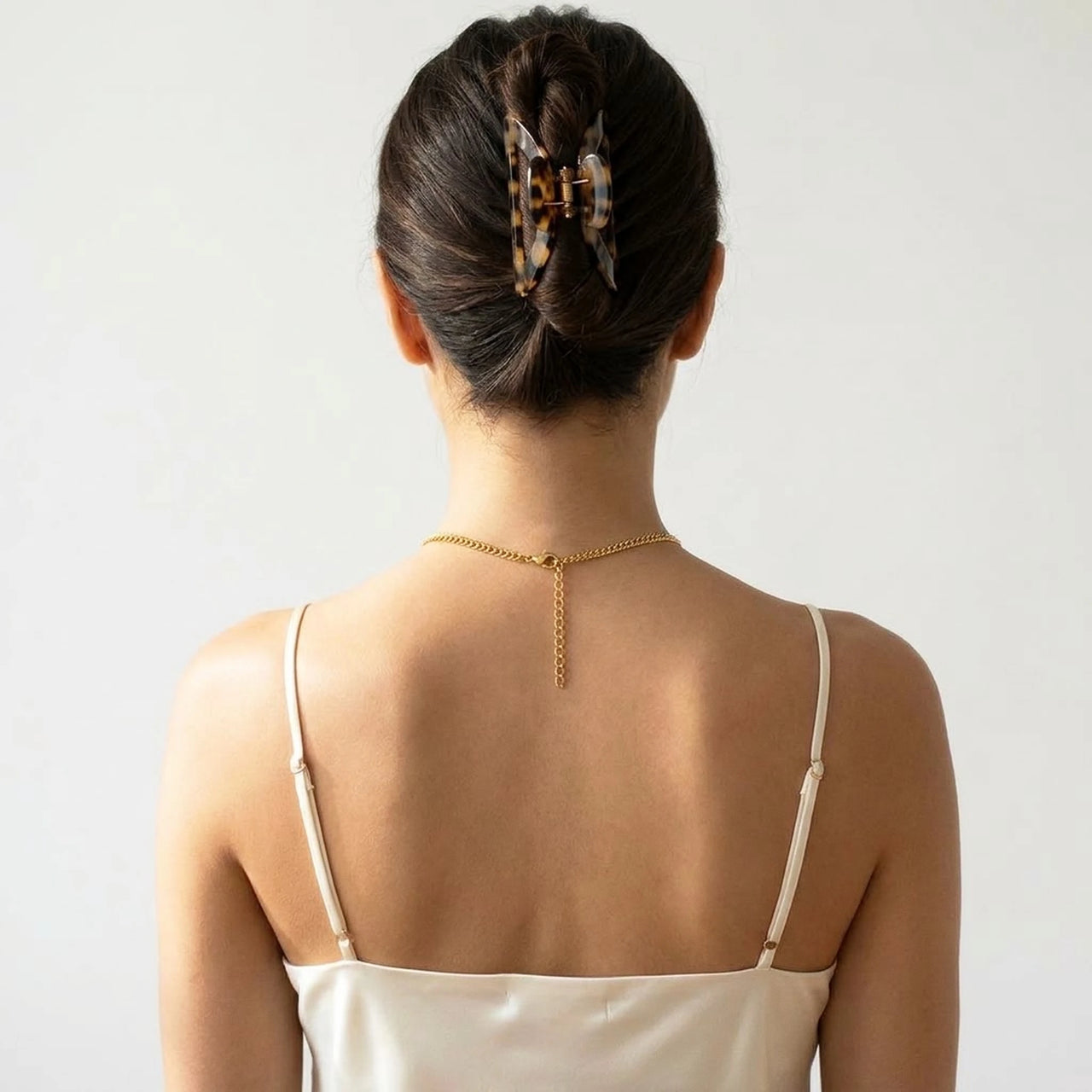 Back of the neck showing the lobster clasp and extension chain of the gold photo necklace | SKU: TPH-RNDN-GOLD