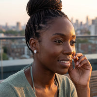 Thumbnail for Woman relaxing on holiday wearing the silver stud earrings | SKU: 505174