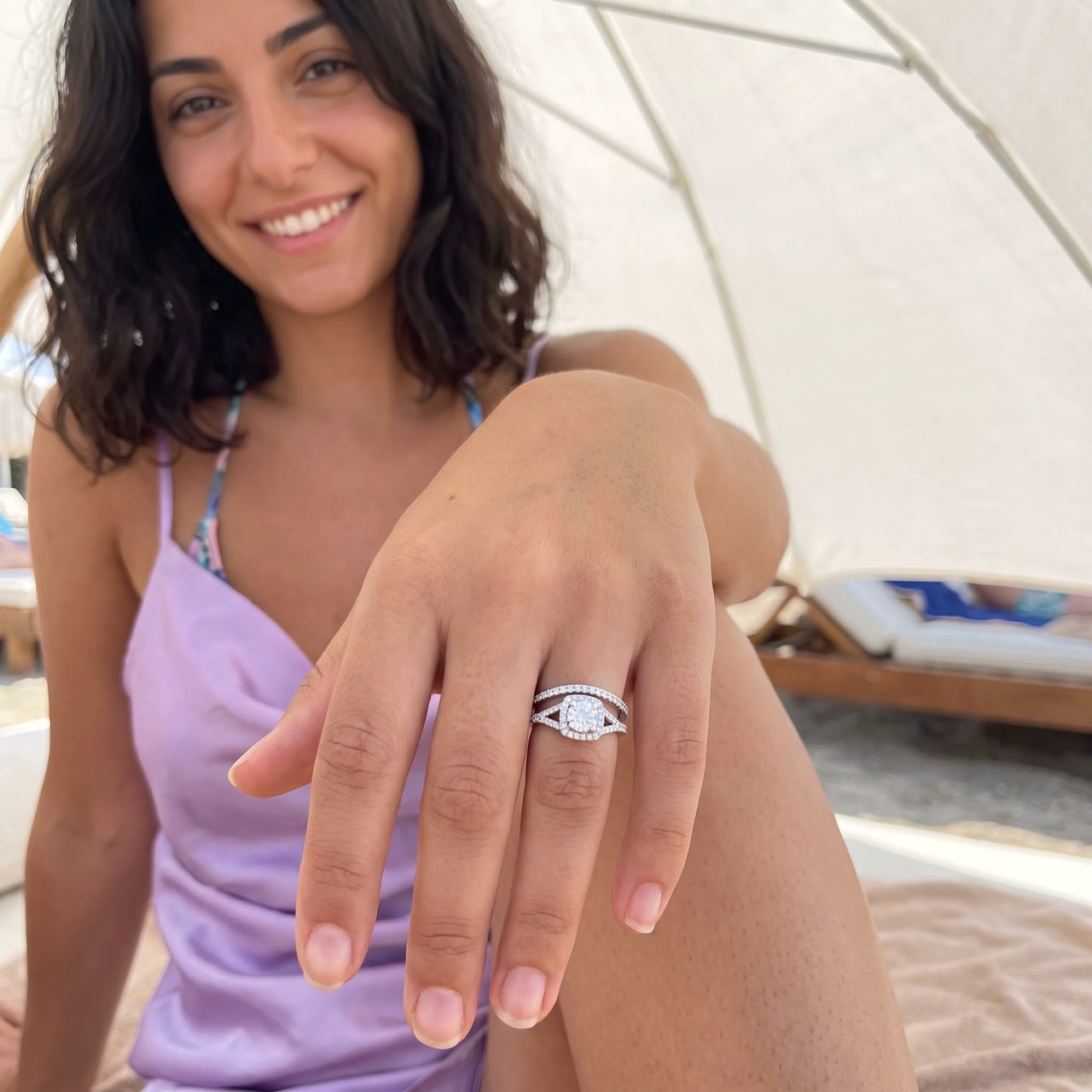 Woman relaxing on holiday wearing the silver ring | SKU: 497080-4.5-silver