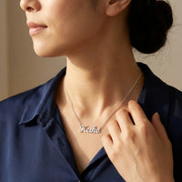 Thumbnail for Minimalist Name Necklace in silver worn in three-quarter profile, the name Keiko | SKU: minimalistnn-silver