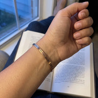 Thumbnail for Travel To Feel Alive bracelet in rose gold worn, showing its real size | SKU: ttfa-rg