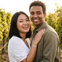 Thumbnail for Couple moment, she wears the Travel To Feel Alive bracelet in silver | SKU: ttfa-wg